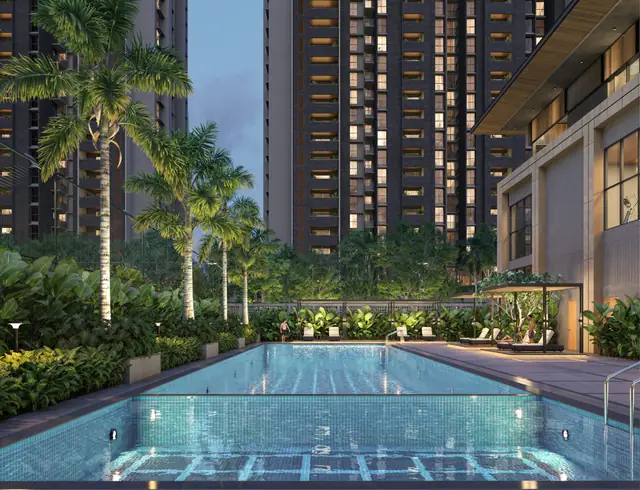 Assetz Niwa & Neo signature clubhouse and pool deck at dusk